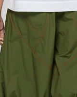 Green pants with contrast stitching detail